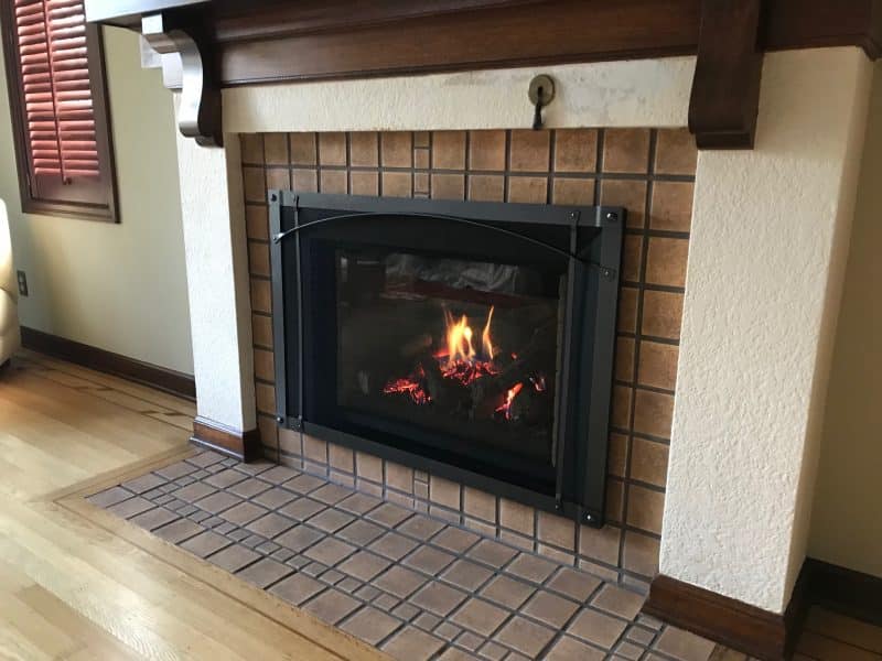 Brown tile fireplace remodel