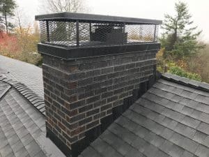 chimney cap by Portland Fireplace and Chimney