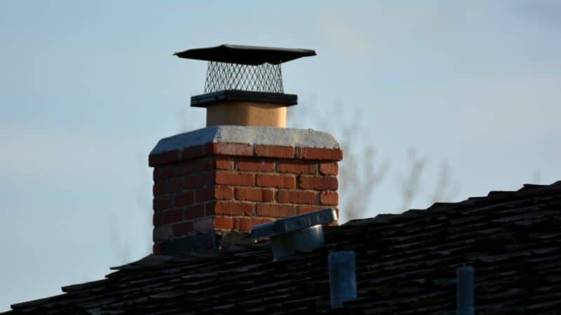 well maintained chimney with a cap